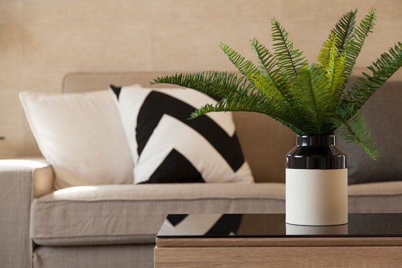 black-and-white-cushion-on-grey-sofa